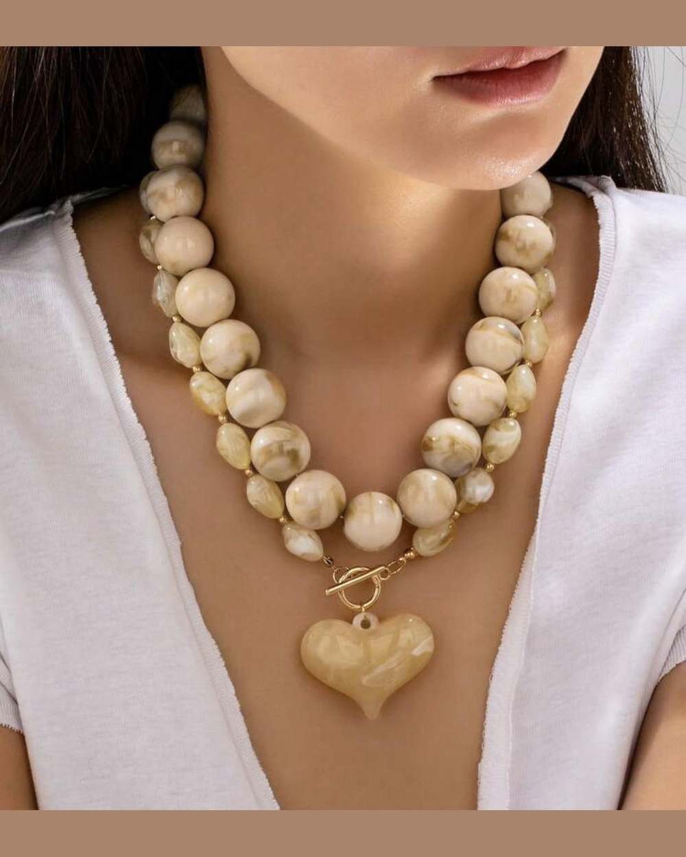 Collar doble vuelta corazon beige
